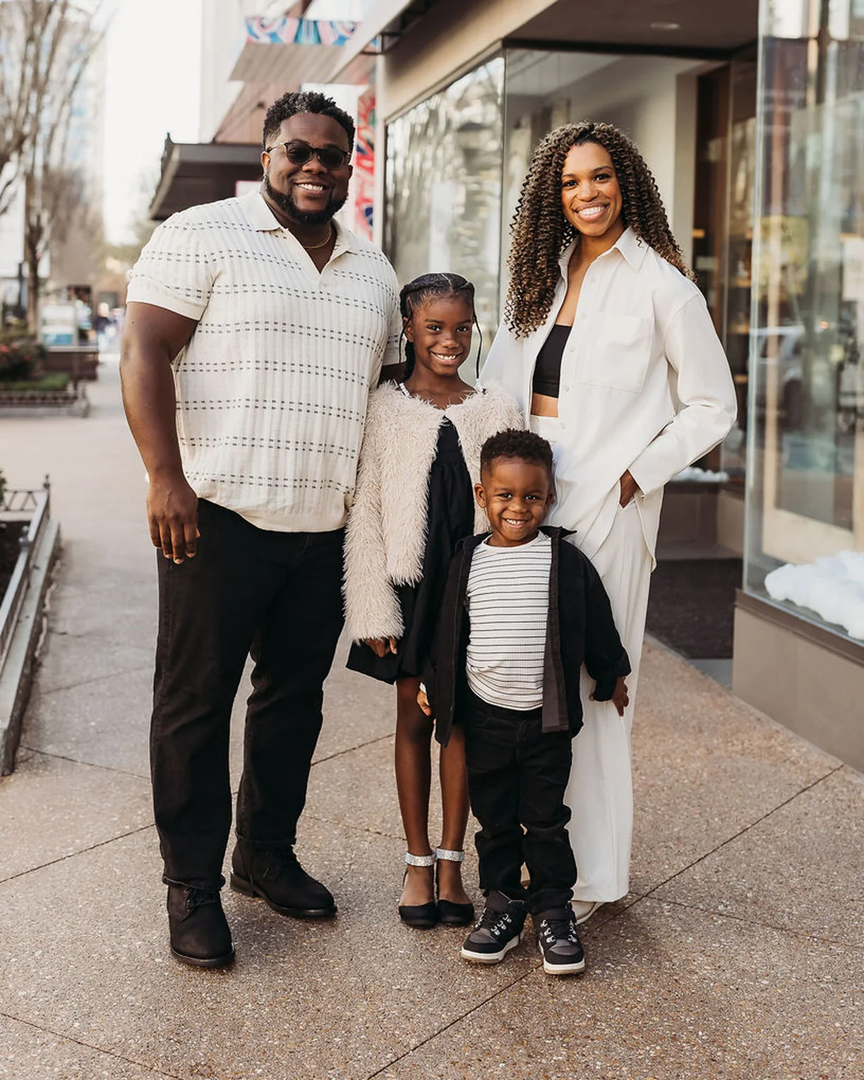 Claude Ball with his wife Azia and their two children